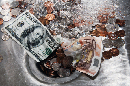 Money being washed down the drain symbolising invested money in an outcome not measured. Credit: https://www.istockphoto.com/portfolio/shaunalexander
