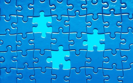 Plain blue puzzle missing several pieces. Credit: https://www.istockphoto.com/portfolio/Alexmia