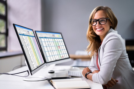 A woman analysing data on a spreadsheet. Credit: https://www.istockphoto.com/au/portfolio/AndreyPopov